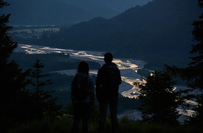 Couple view of the valley at night